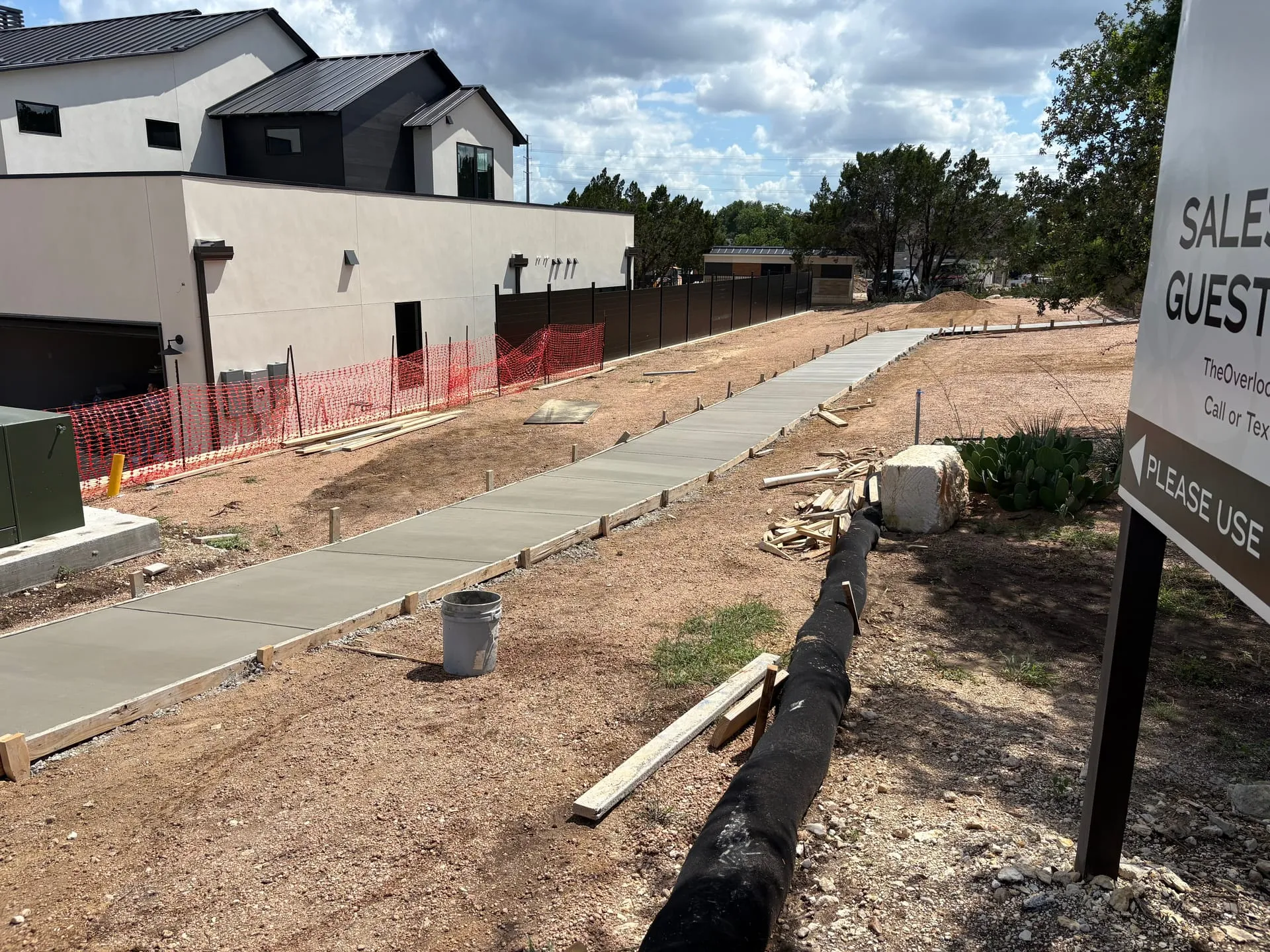 Concrete sidewalk installation in progress