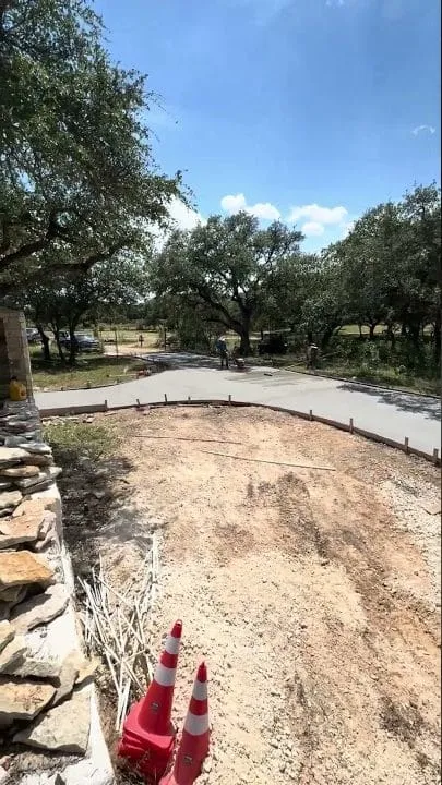 Concrete curing and finishing on the San Marcos driveway