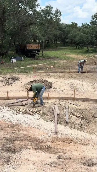 Rough framing and formwork during San Marcos driveway site preparation